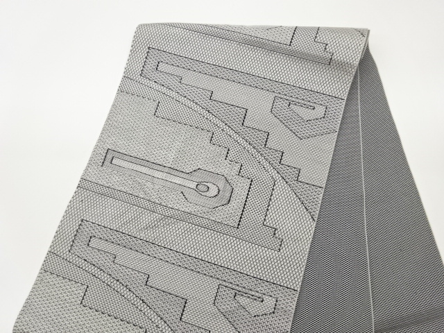  幾何学模様織出し名古屋帯